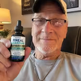 Customer Danny R. holding Pineal Guardian Advanced