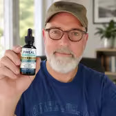 Customer Keith A. holding Pineal Guardian Advanced
