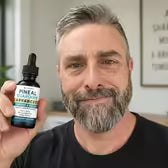 Customer Marcus T. holding Pineal Guardian Advanced