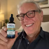 Customer Ronald F. holding Pineal Guardian Advanced